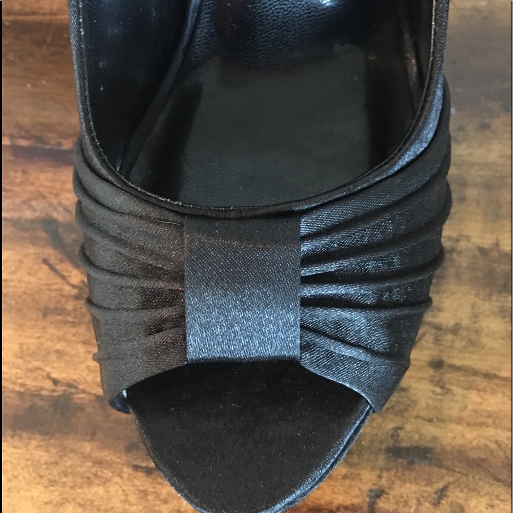 Size 7.5 black sateen heels. Worn twice only!